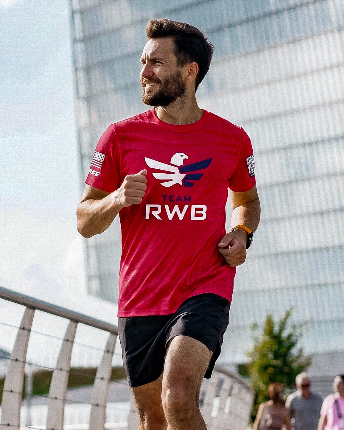 Team RWB Soffe Performance Mesh T-Shirt Red – lifestyle front view, male Eagle running outdoors