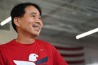 Team RWB member smiling in Men's Nike Dri-FIT T-Shirt